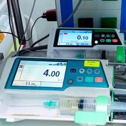 Medical infusion pump for precise delivery of drugs into the bloodstream. Syringe pump in an intensive care unit.