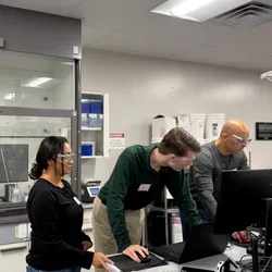 Lab team conducting regular equipment maintenance