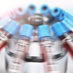 Blood test tubes spinning in centrifuge. 