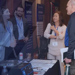 Group of attendees and exhibitors talking during the Lab Manager Leadership Summit
