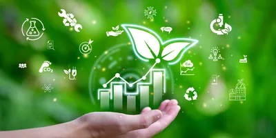 Hand holding a green leaf with laboratory sustainability icons