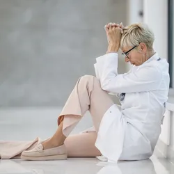 Stressed lab manager experiencing leadership burnout