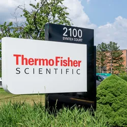 Thermo Fisher facility sign highlighting data solutions for clinical research