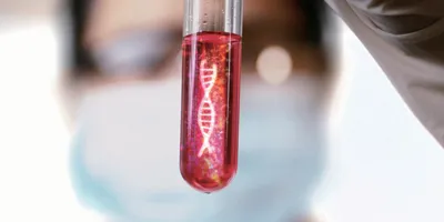 Scientist holding up a blood vial with an illustration of DNA