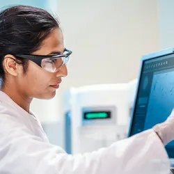 Scientist engaging in digital transformation in QC lab