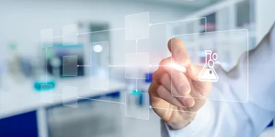 Scientist working on a digital LIMS system