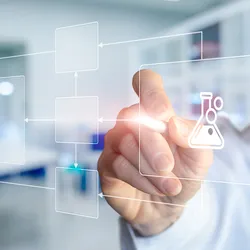 Scientist working on a digital LIMS system