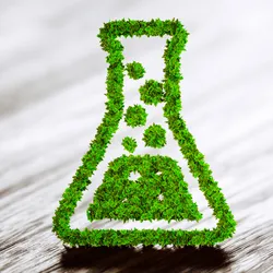 Lab flask made of greenery highlighting green lab certification