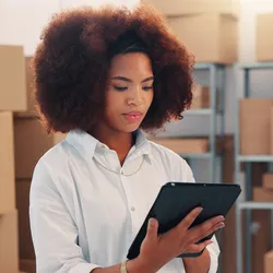 Scientist noting details during a lab move