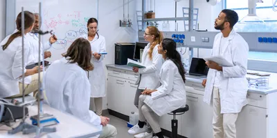 Laboratory team engaged in lab staff training and learning