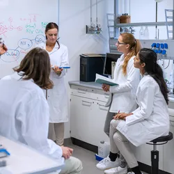 Laboratory team engaged in lab staff training and learning