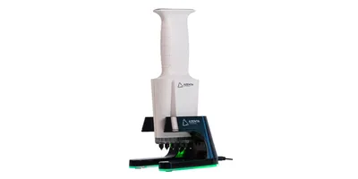 Azenta IntelliXcap benchtop automated tube capper/decapper with white vertical column and black base, illuminated with green LED accents.