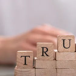 Blocks arranged to enhance workplace trust concept