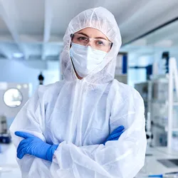 Individual in lab attire advocating for workplace safety
