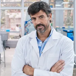 Laboratory manager overseeing staff in lab environment