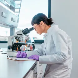 Female scientist conducting non-animal testing research