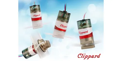 Five small Clippard electronic valves with red-and-white labels shown at different angles against a light blue, abstract background; colored wires extend from the tops and clear tubing connects to the fittings.