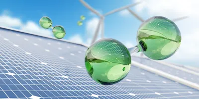 Solar panels and wind turbines with green hydrogen molecules representing sustainable energy for laboratory gas chromatography operations