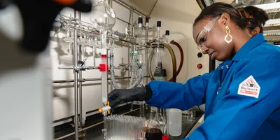 Scientist working with lab equipment in a laboratory