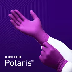 A scientist wearing a white lab coat pulls on a purple Kimtech Polaris nitrile exam glove against a dark purple background featuring a subtle honeycomb pattern and the white Kimtech Polaris logo.