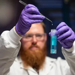 Lab technician analyzing a sample for PFAS detection