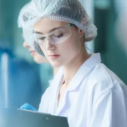 Lab technician focused on quality assurance tasks