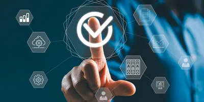 A person touching a digital checkmark icon, symbolizing corporate compliance, quality control and data governance