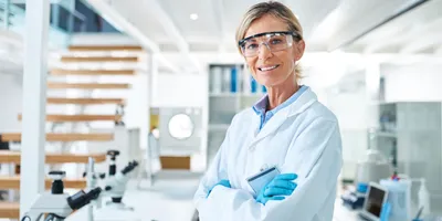 Chemist engaged in safety-focused laboratory work