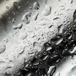 Water drops on metal surface.