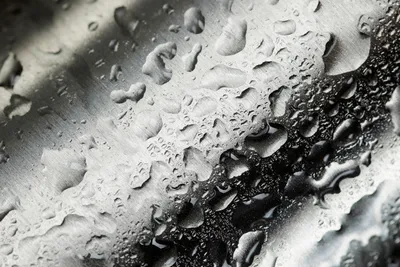 Water drops on metal surface.