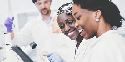 Collaboration in the lab highlighting the importance of psychological safety.