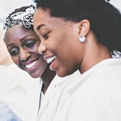 Collaboration in the lab highlighting the importance of psychological safety.