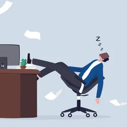 Employee disengaged at work, showcasing quiet quitting mentality