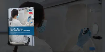 Woman scientist working in a biosafety cabinet