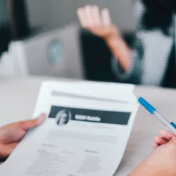 Candidate discussing resume in an interview setting