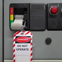 Lockout tagout device on equipment, indicating danger and maintenance