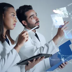 Researchers analyzing AI data in a laboratory setting.