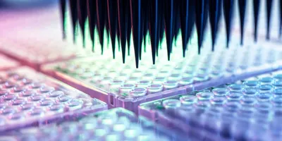 Pipette tips over multi-well plates for genomic analysis