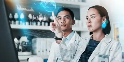 Scientists engaging with AI technology in a lab environment