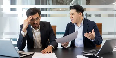 A frustrated employee during a tense lab management discussion