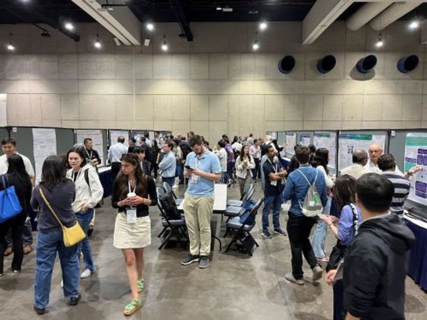 Conference attendees discussing mass spectrometry innovations at ASMS 2026.