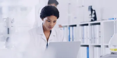 Lab manager working with a LIMS in the lab.