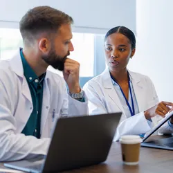 Collaborative conversation on employee development in a lab