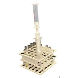 A handheld SPEedy solid phase extraction device sits in a laboratory test tube rack demonstrating its compact footprint.