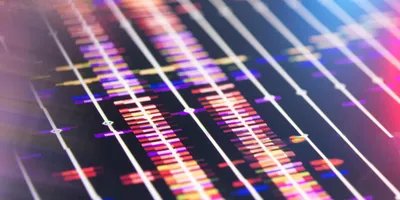 Close-up of DNA sequencing data displayed as aligned genomic reads on a computer screen.