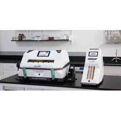 Epredia SlideTracker and BlockTracker automated pathology specimen tracking systems on a lab bench, with slide and cassette input trays loaded.