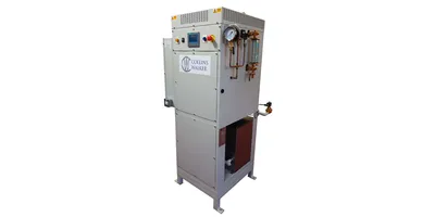 A Collins Walker ELV electric steam boiler with pressure gauge, copper pipework, touchscreen controller, and sight glass on a grey steel enclosure for laboratory steam sterilization.