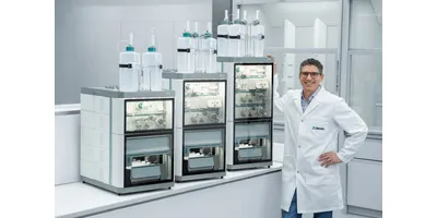A scientist stands next to three configurations of the Metrohm OMNIS IC automated ion chromatography system in a modern laboratory setting.