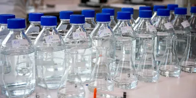 Laboratory equipment laboratory storage bottles with blue polypropylene cap on white
