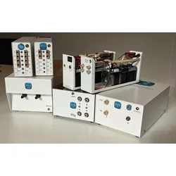 The full DEGASi NG HPLC degasser family from Biotech Fluidics, including Classic, FlatFilm, and Prep models in white housings displayed on a laboratory bench.